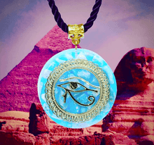 Load image into Gallery viewer, An orgonite pendant necklace with Amazonite stones and a copper "Eye of Horus" energy patch.