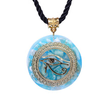 Load image into Gallery viewer, An orgonite pendant necklace with Amazonite stones and a copper "Eye of Horus" energy patch.