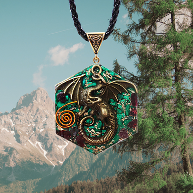 Orgonite pendant necklace with malachite and garnet stones. Features a metal dragon and copper energy spire on the front.