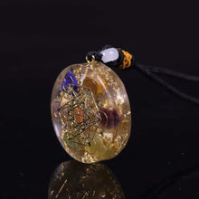 Load image into Gallery viewer, An orgonite pendant necklace with seven stones and a sacred Metatron's Cube copper energy patch.