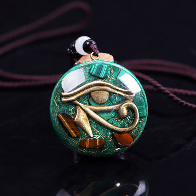 Orgonite necklace with Malachite and Tigers Eye. Features the Eye of Horus.
