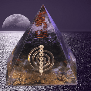 An orgonite pyramid with labradorite and obsidian stones.