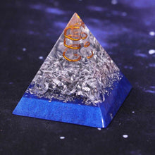Load image into Gallery viewer, An orgonite pyramid with Quartz crystal in a copper energy spire, and aluminum shavings.