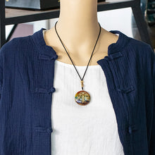 Load image into Gallery viewer, Orgonite necklace with seven different stones & a tree of life energy patch.