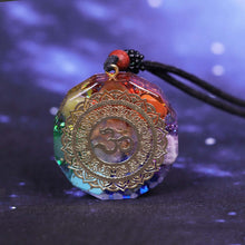 Load image into Gallery viewer, An orgonite pendant necklace with seven stones and a copper 'Aum' energy patch.