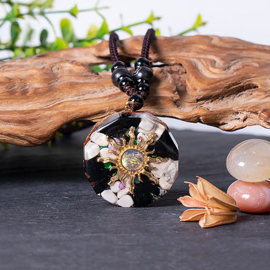 Mermaid's Tale orgonite necklace with obsidian and howlite stones from The Orgone Shop.