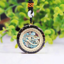 Load image into Gallery viewer, Full view of the orgonite necklace with adjustable cord, displayed flat on a white surface to show the entire piece including clasp and cord.