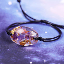 Load image into Gallery viewer, Orgonite bracelet with Amethyst crystals and Gold Foil shavings sold at The Orgone Shop.