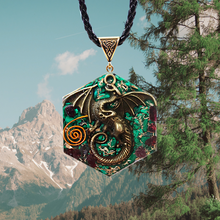 Load image into Gallery viewer, Orgonite pendant necklace with malachite and garnet stones. Features a metal dragon and copper energy spire on the front.