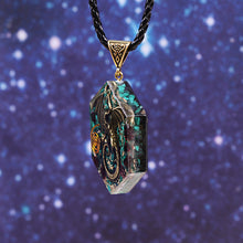 Load image into Gallery viewer, Orgonite necklace with Malachite and Garnet crystals. Features a metal dragon and copper energy coil.