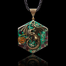 Load image into Gallery viewer, Orgonite necklace with Malachite and Garnet crystals. Features a metal dragon and copper energy coil.