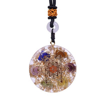 Load image into Gallery viewer, An orgonite pendant necklace with seven stones and a sacred Metatron&#39;s Cube copper energy patch.