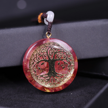 Load image into Gallery viewer, Orgonite Necklace with Rose Quartz and gold Tree of Life emblem.