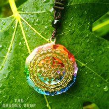 Load image into Gallery viewer, An orgonite necklace with seven stones and a copper Sri Yantra energy patch.