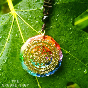 An orgonite necklace with seven stones and a copper Sri Yantra energy patch.