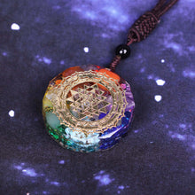 Load image into Gallery viewer, An orgonite necklace with seven stones and a copper Sri Yantra energy patch.