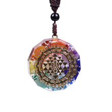 Load image into Gallery viewer, An orgonite necklace with seven stones and a copper Sri Yantra energy patch.