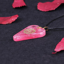 Load image into Gallery viewer, A heart shaped orgonite pendant necklace with Rose Quartz crystals and a Sri Yantra copper energy patch.