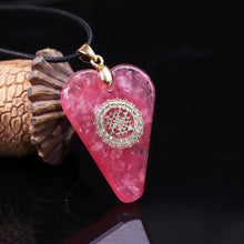 Load image into Gallery viewer, A heart shaped orgonite pendant necklace with Rose Quartz crystals and a Sri Yantra copper energy patch.