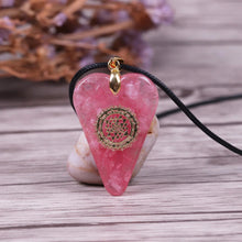 Load image into Gallery viewer, A heart shaped orgonite pendant necklace with Rose Quartz crystals and a Sri Yantra copper energy patch.