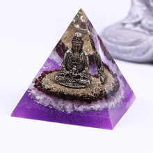 Load image into Gallery viewer, Orgonite pyramid with Rose Quartz crystals, gold foil shavings and a Buddha statue. 