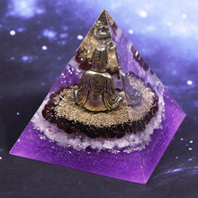 Load image into Gallery viewer, Orgonite pyramid with Rose Quartz crystals, gold foil shavings and a Buddha statue. 