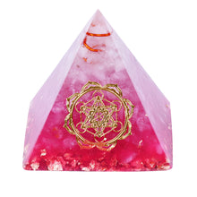 Load image into Gallery viewer, A vibrant pink orgonite pyramid with quartz crystals and a quartz-copper energy coil. Features a copper Metatron&#39;s Cube energy patch and gold foil shavings.