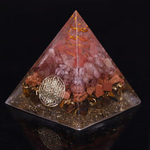 Load image into Gallery viewer, An orgonite pyramid with Strawberry Quartz, Tiger&#39;s Eye and Goldstone crystals. Features a Quartz crystal set in a Copper Energy Coil and Flower of Life copper energy patch.