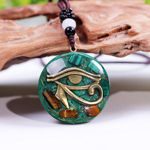 Orgonite necklace with Malachite and Tigers Eye. Features the Eye of Horus.