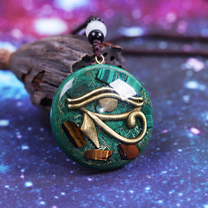 Orgonite necklace with Malachite and Tigers Eye. Features the Eye of Horus.