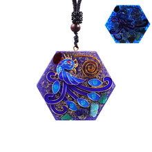 Load image into Gallery viewer, An orgonite necklace with a blue phoenix design and glow in the dark view.