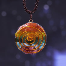 Load image into Gallery viewer, Orgonite pendant necklace with six types of crystal, silver foil shavings and a spiral copper energy coil.