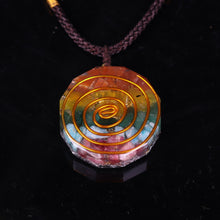 Load image into Gallery viewer, Orgonite pendant necklace with six types of crystal, silver foil shavings and a spiral copper energy coil.