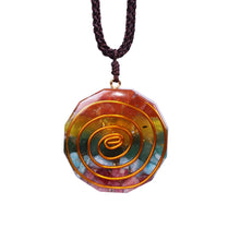 Load image into Gallery viewer, Orgonite pendant necklace with six types of crystal, silver foil shavings and a spiral copper energy coil.