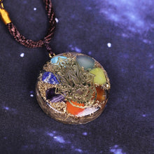 Load image into Gallery viewer, Orgonite pendant necklace with seven stones and a copper Hamsa energy patch.