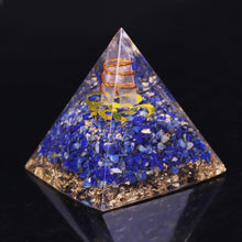 Load image into Gallery viewer, An orgonite pyramid with Lapis Lazuli &amp; Quartz crystals. Includes a Sri Yantra and Aum copper energy patch.