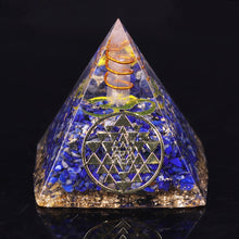 Load image into Gallery viewer, An orgonite pyramid with Lapis Lazuli &amp; Quartz crystals. Includes a Sri Yantra and Aum copper energy patch.