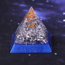 Load image into Gallery viewer, An orgonite pyramid with Quartz crystal in a copper energy spire, and aluminum shavings.