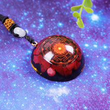 Load image into Gallery viewer, A red orgonite necklace with a Lotus flower design. Orgonite pendant contains Red coral, Red Sea Glass, Resin, Gold Foil