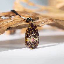 Load image into Gallery viewer, &quot;Evil Eye&quot; Protective Orgonite Amulet Necklace with Garnet &amp; Tiger Eye