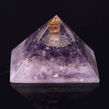 Load image into Gallery viewer, An orgonite pyramid containing natural Amethyst and Rose Quartz crystals. The top layer has an orgone energy copper coil on top of a copper energy patch.